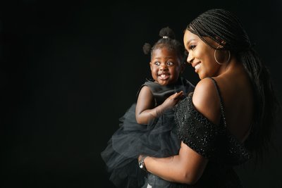 Elegant Mother and Daughter Studio Portrait