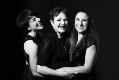 Joyful Three-Generations Mother and Daughter Portrait