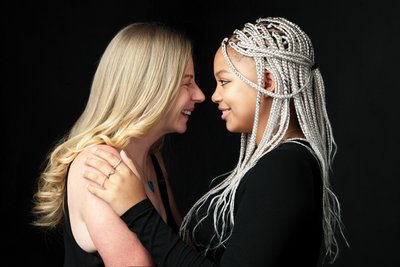 Vibrant Mother and Daughter Studio Portrait