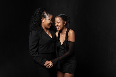 Fun-Loving Mother and Daughter Studio Portrait