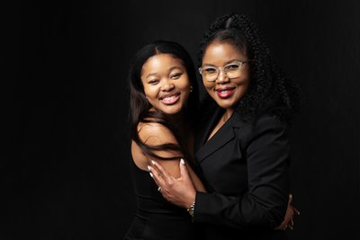 Stylish Mother and Daughter Studio Portrait