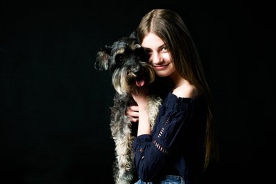 Heartwarming Portrait of Girl and Schnauzer