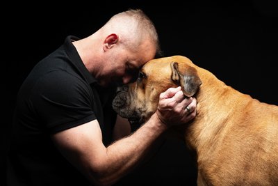 Emotive Portrait of Man and Bull Mastiff 