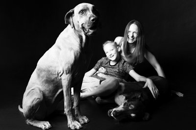 Black-and-White Family Portrait with Dogs