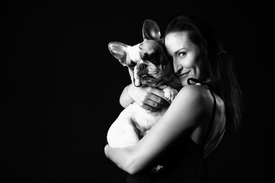 Black-and-White Portrait of Woman and French Bulldog