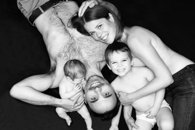 Family Fun: Playful Moment with Newborn