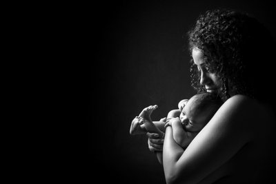 Mother's Gentle Hold: Newborn Comfort