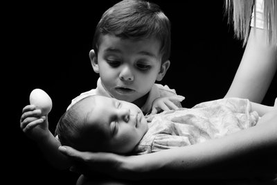 Sibling Curiosity: Watching Over Newborn