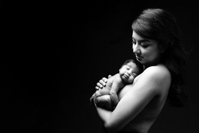 Mother’s Tender Newborn Portrait