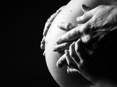 Intimate Black and White Maternity Portrait with Hands