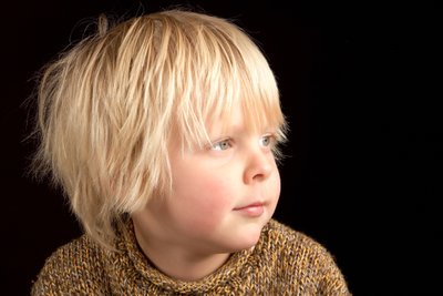 Thoughtful Young Boy: Award-Winning Gaze of Wonder 