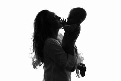 Silhouette of Love: Mother and Baby Bond