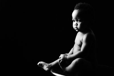 Serene Contemplation: Baby in Monochrome