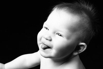 Playful Baby Expression in Black and White