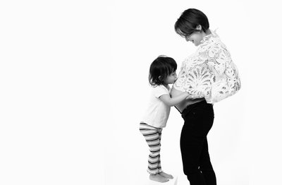 Joyful Maternity Portrait with Young Sibling