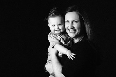 Smiling Mum Holding Her Baby Boy