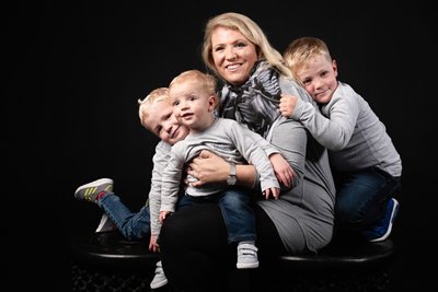 Mum with Her Three Sons in Coordinated Outfits