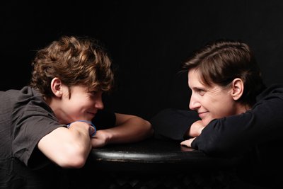 Mother and Teen Son in Playful Eye Contact