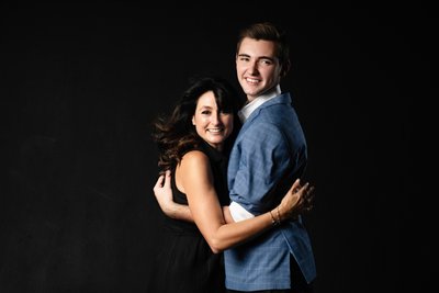 Elegant Hug with Her Grown Son