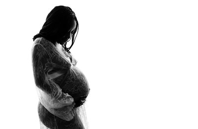 Silhouetted Maternity Portrait in Lace Robe
