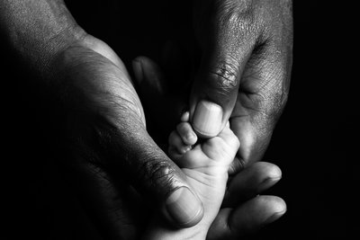 Tiny Hand, Tender Touch: Newborn and Parent Bond