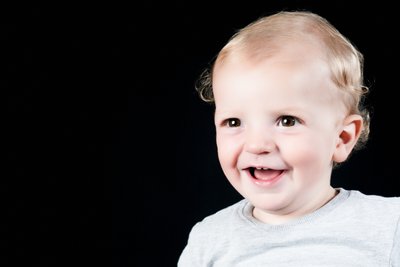 Smiling studio baby portrait in Johannesburg