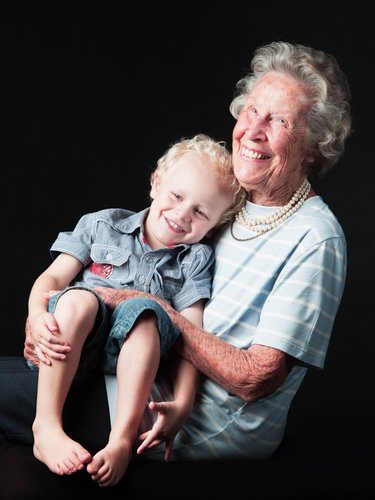 Joyful Grandmother with Grandson Laughing Together