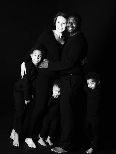 Unified Family Portrait in Elegant Black Attire