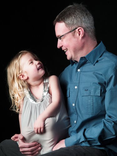 Father and Young Daughter Sharing a Laugh