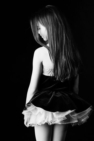 Young Dancer in Poised Elegance