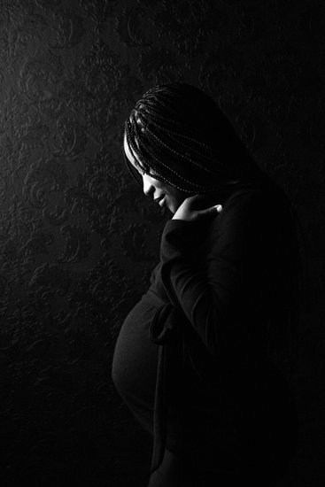 Moody Maternity Portrait with Braided Hair