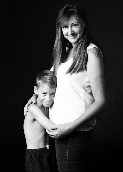 Young Son Hugging His Mum