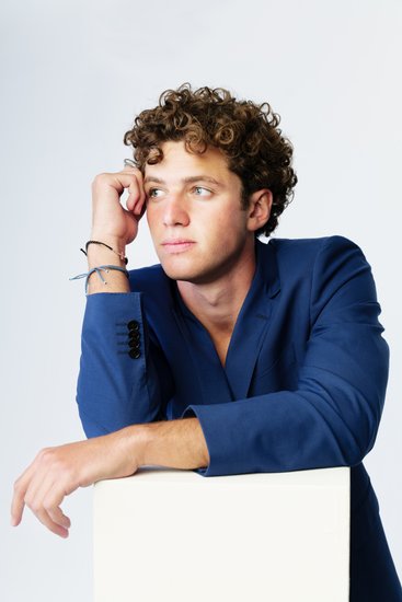 Male Model in Blue Blazer Gazing Away