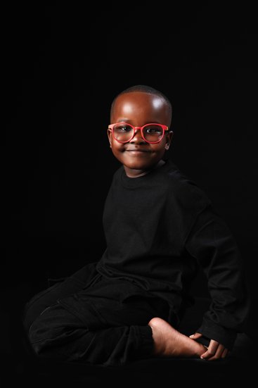 Child portrait in Johannesburg | red glasses