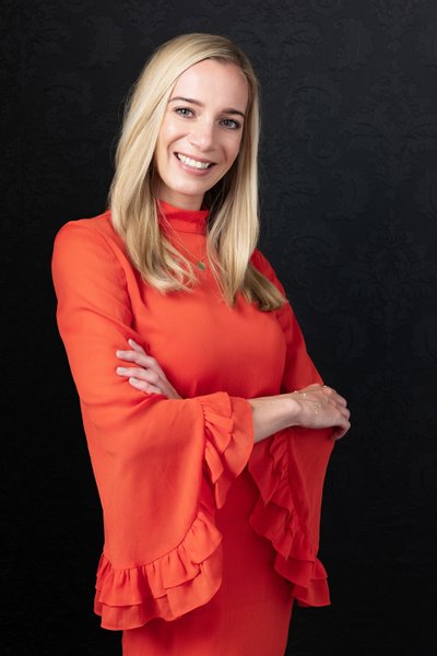 Vibrant Professional Headshot in Orange Dress