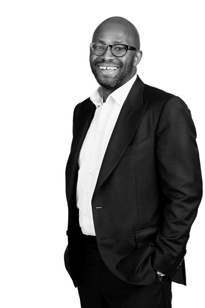 Black-and-White Professional Headshot with Warm Smile