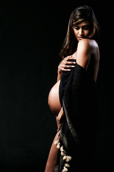 Graceful Maternity Portrait with Black Drape