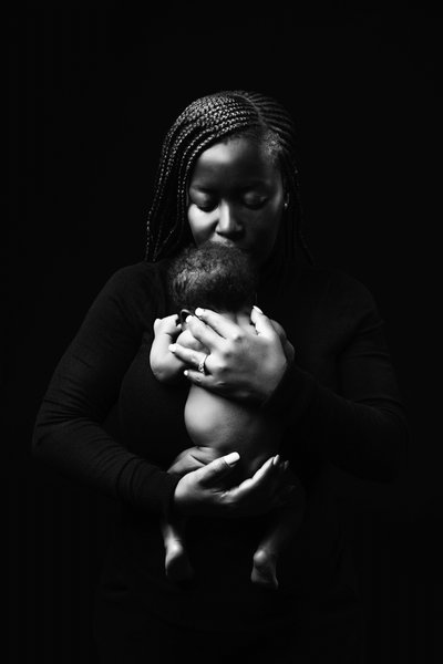 Mother's Embrace: Newborn Bond in Black & White