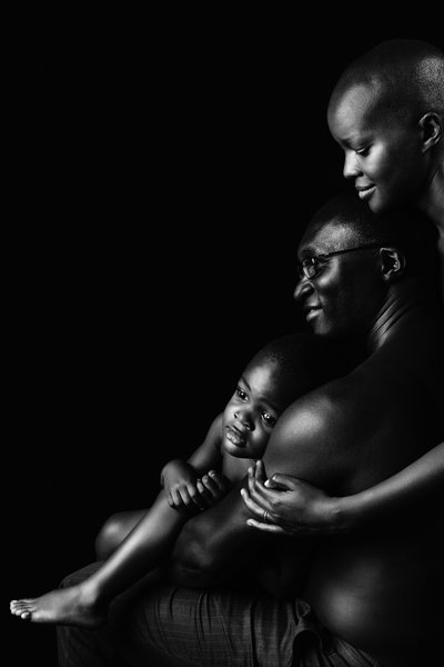 Family Embrace in Monochrome Studio Portrait