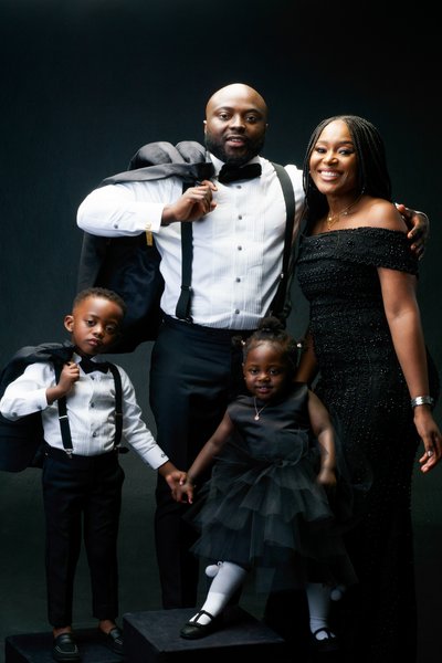 Elegant Family Portrait in Black-Tie Formal Attire