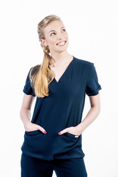 Confident Portrait of a Nurse in Navy Scrubs