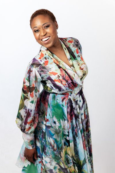 Vibrant Portrait of a Woman in a Floral Dress