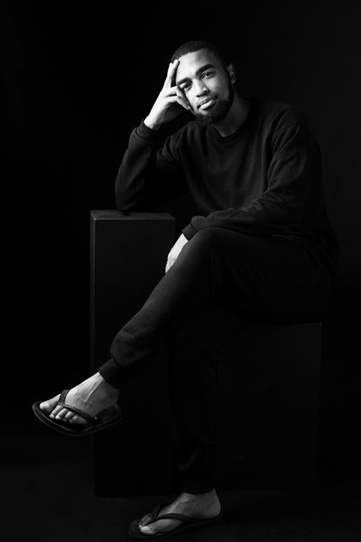 Relaxed Black-and-White Full-Body Portrait