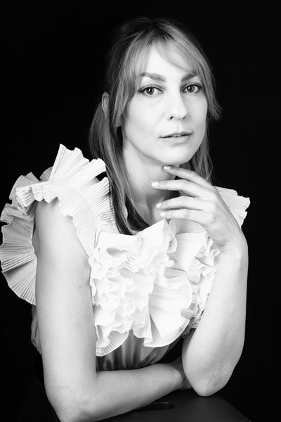 Elegant Black-and-White Portrait with Ruffled Attire