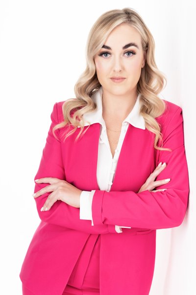 Professional Portrait of a Woman in a Pink Suit