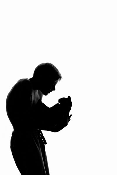 Silhouette of a Tender Moment with a Cat