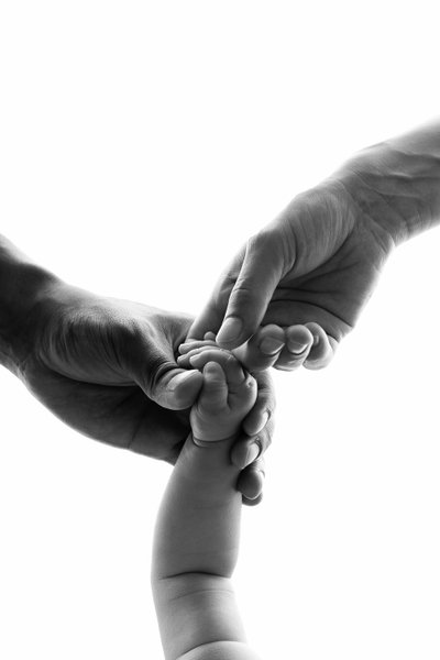 Family Hands Newborn Connection