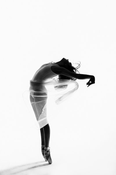 Ethereal Award-Winning Ballerina in Flowing Silhouette