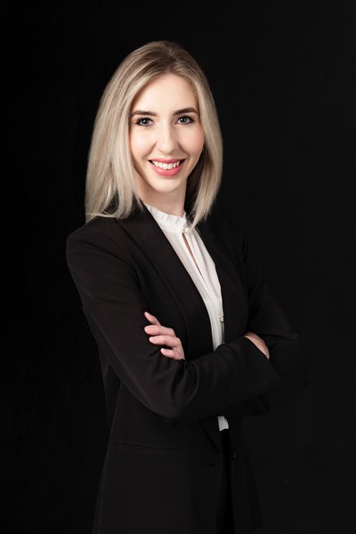 Confident Professional Headshot in Sleek Black Attire