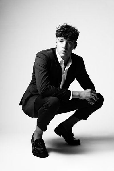 Modern Suit Style in High-Contrast Portrait